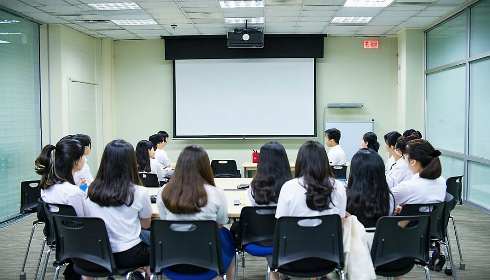 Taiwanese professionals participating in a business English workshop